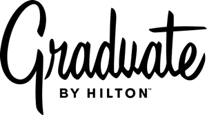 A black silhouette of a cat sitting and looking upward, with its tail curled around its body on a white background.