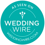 Turquoise circular badge with white text reading "As Seen On Wedding Wire" and "weddingwire.com," with a simple bouquet icon at the top.