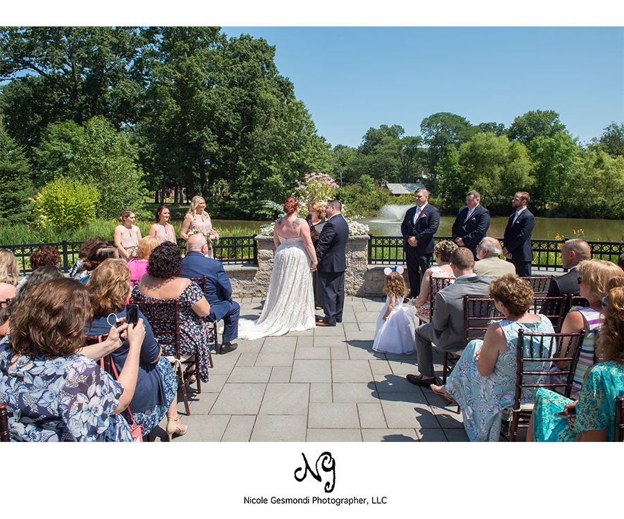 small wedding ceremony on patio at the Pond House in West Hartford, CT small wedding ceremony on patio at the Pond House in West Hartford, CT