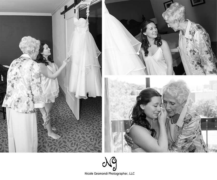 precious moment of bride and her grandmother on her wedding day bride showing her wedding gown to her grandmother