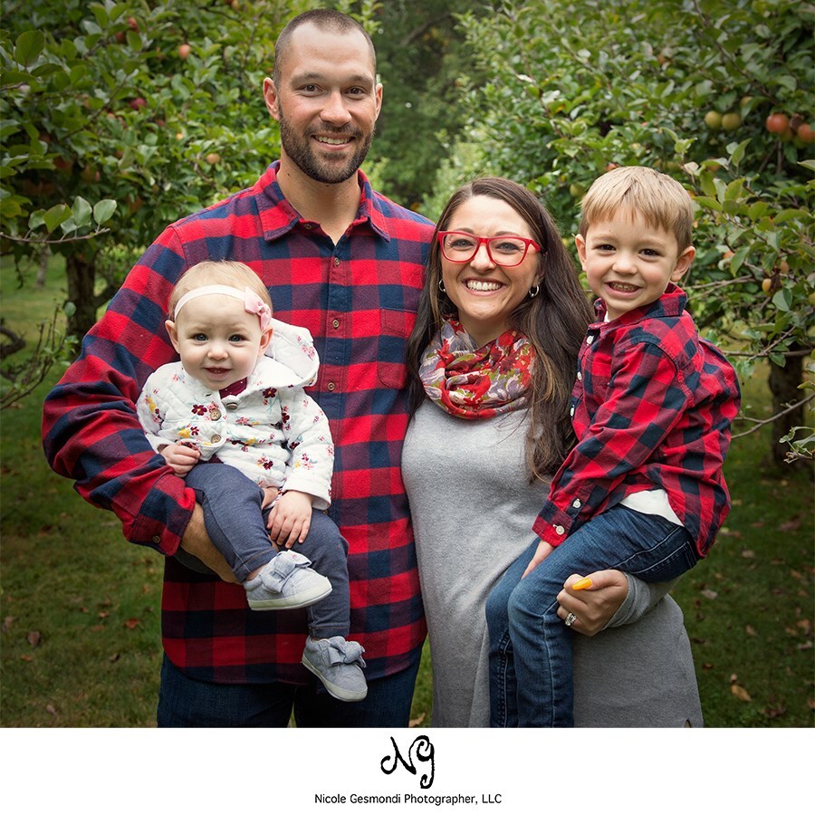 color coordinated outfits for fall family photos family wearing matching red plaid outfits for fall photos