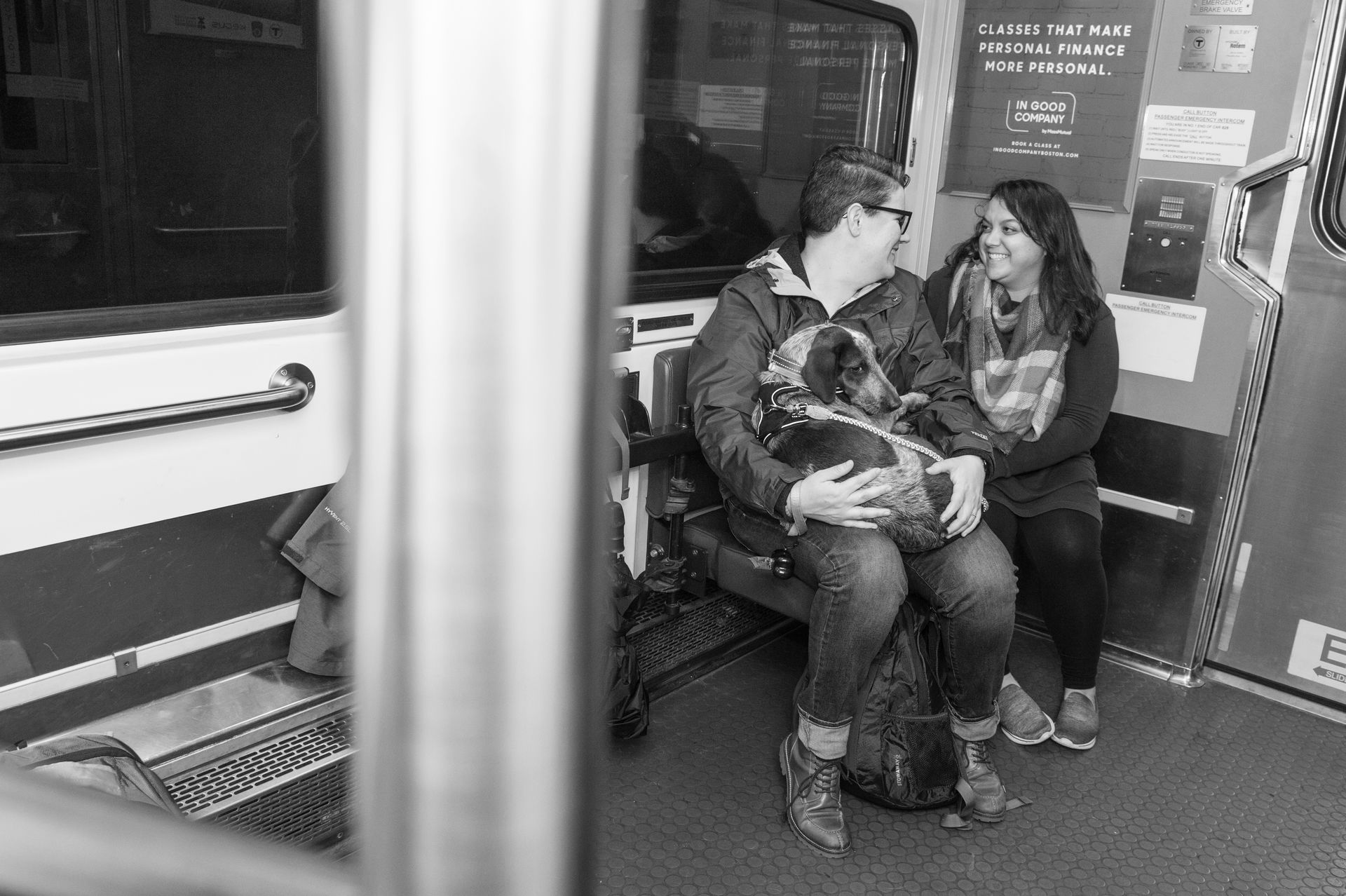 black and white candid engagement photos on T to boston black and white candid engagement photos on T to boston