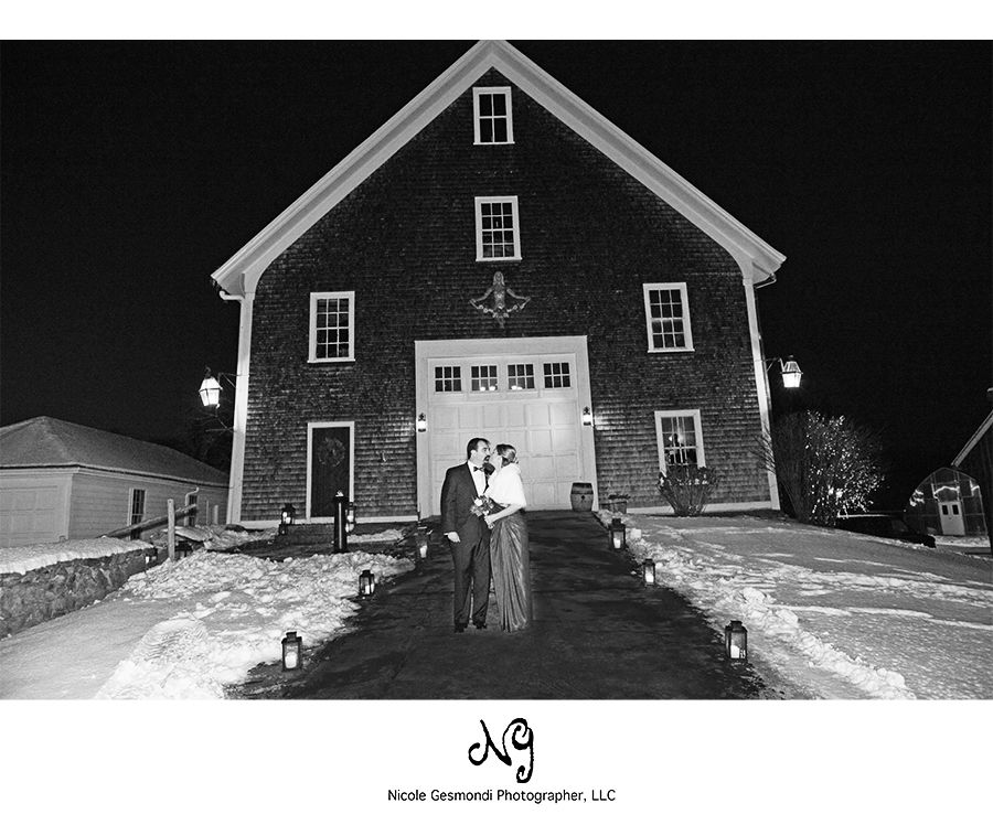 bride and groom standing outside the barn winter mt hope farm wedding bride and groom standing outside the barn winter mt hope farm wedding
